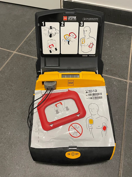 Defibrillateur-Physio-Control-Lifepak-CR+-avec-instructions-de-reanimation-et-electrodes.jpg