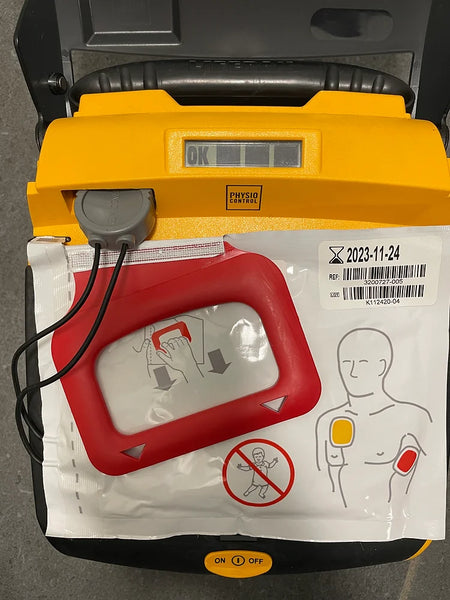 Defibrillateur-Physio-Control-Lifepak-CR+-avec-instructions-de-reanimation-et-electrodes.jpg