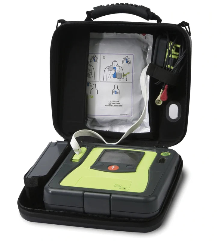 Défibrillateur Zoll AED PRO avec électrodes et affichage d'instructions pour réanimation cardiaque